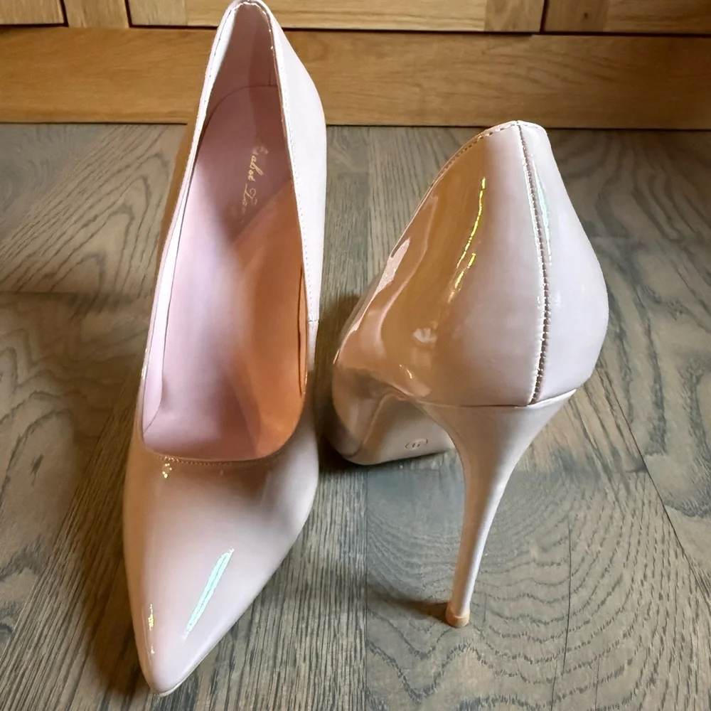 Worn once Elizabet Lang classic statement nude patent leather 4 inch heel shoes.